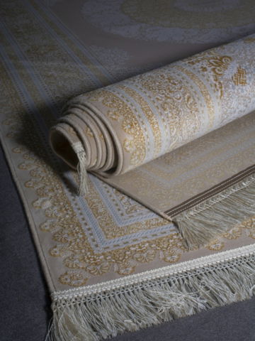 a-rug-with-fringes-laying-on-top-of-it.jpg a rug with fringes laying on top of it